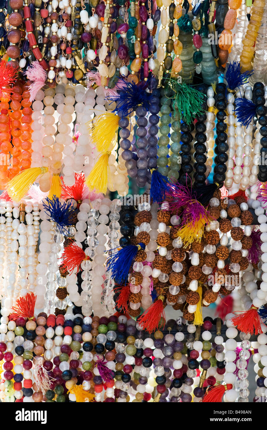 Wrist japamalas or religious counting beads hanging from a market stall in India Stock Photo