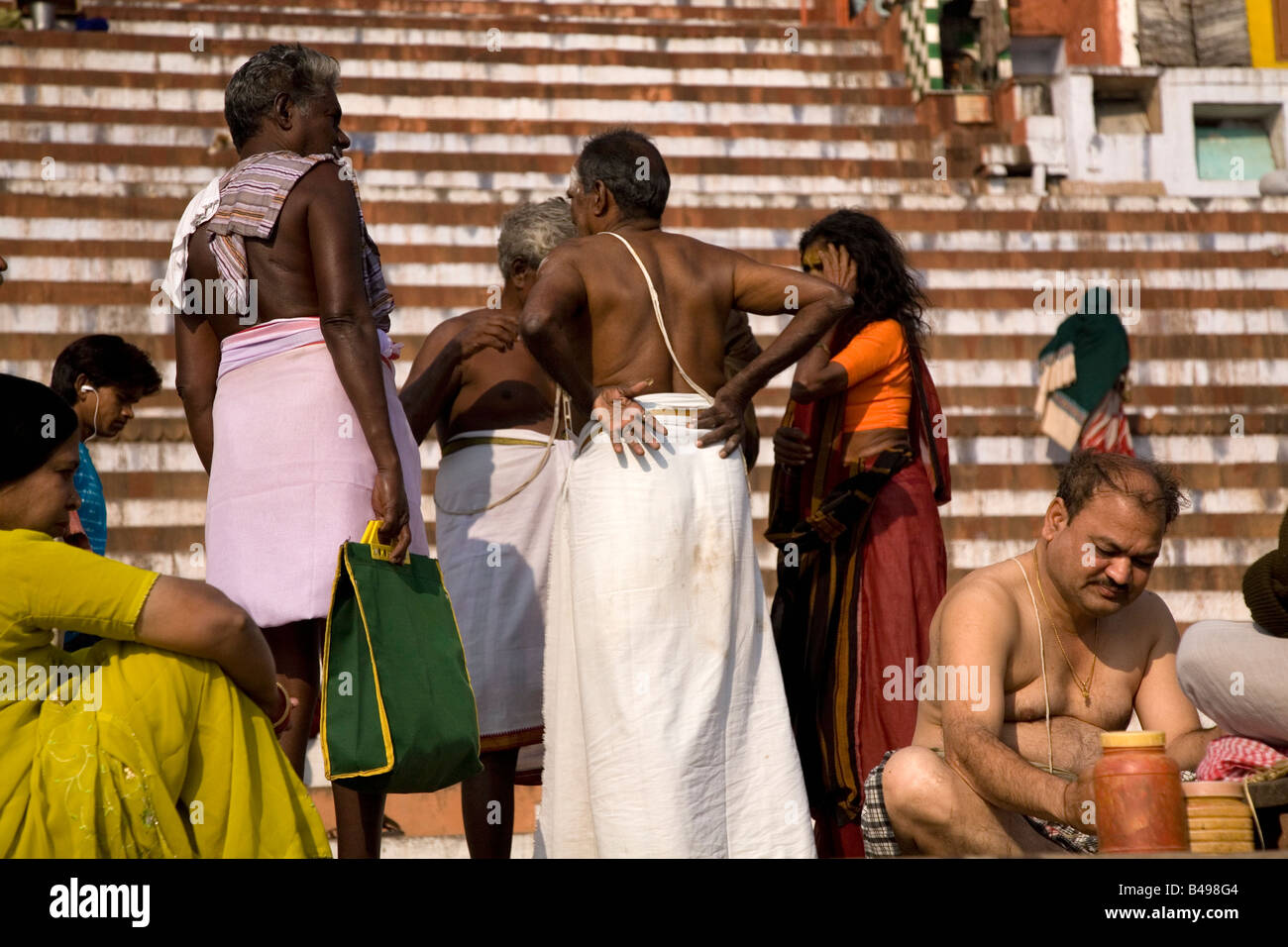 People gather on the ghats in the city of Varanasi, India. Stock Photo
