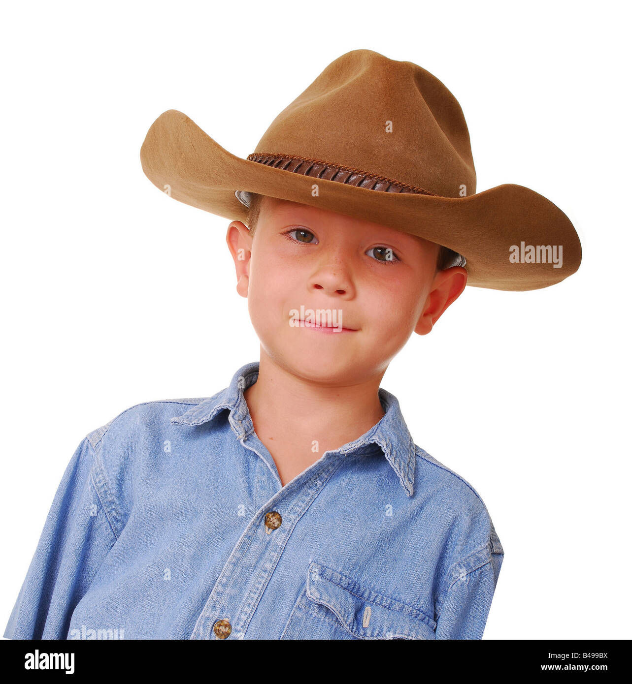 Young boy wearing a cowboy hat isolated on white Stock Photo - Alamy