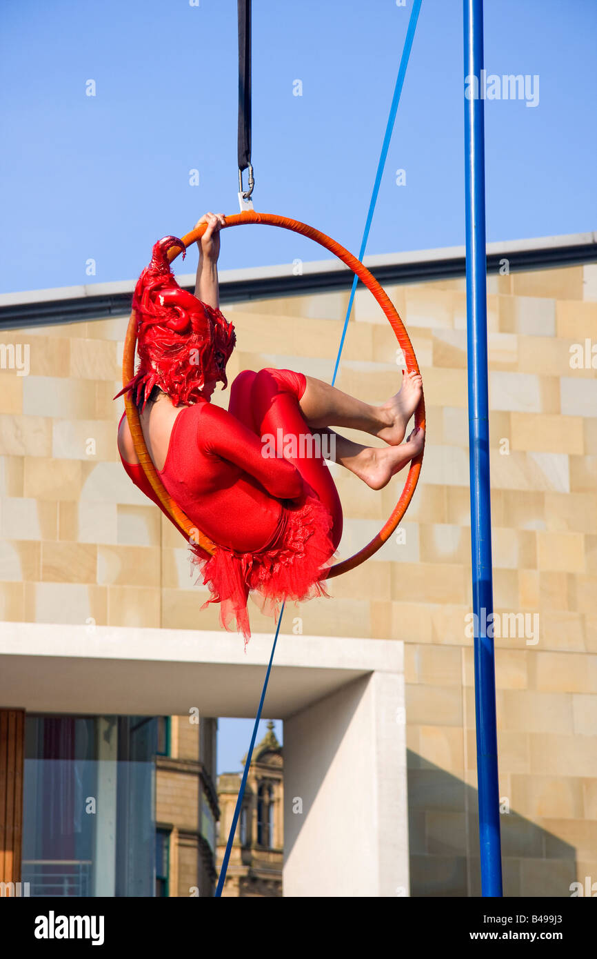 Performing acrobatic, artist in Centenary Square, Bradford, West ...