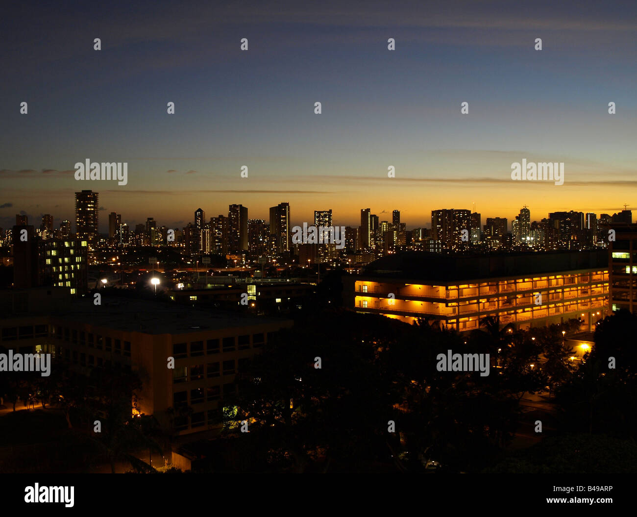 Waikiki skyline at dusk, from the University of Hawaii campus Stock