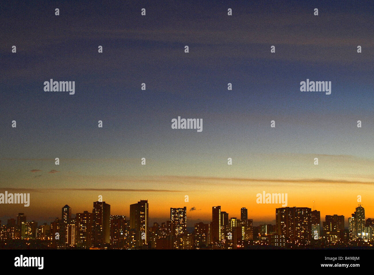 Waikiki skyline at dusk, from the University of Hawaii campus Stock