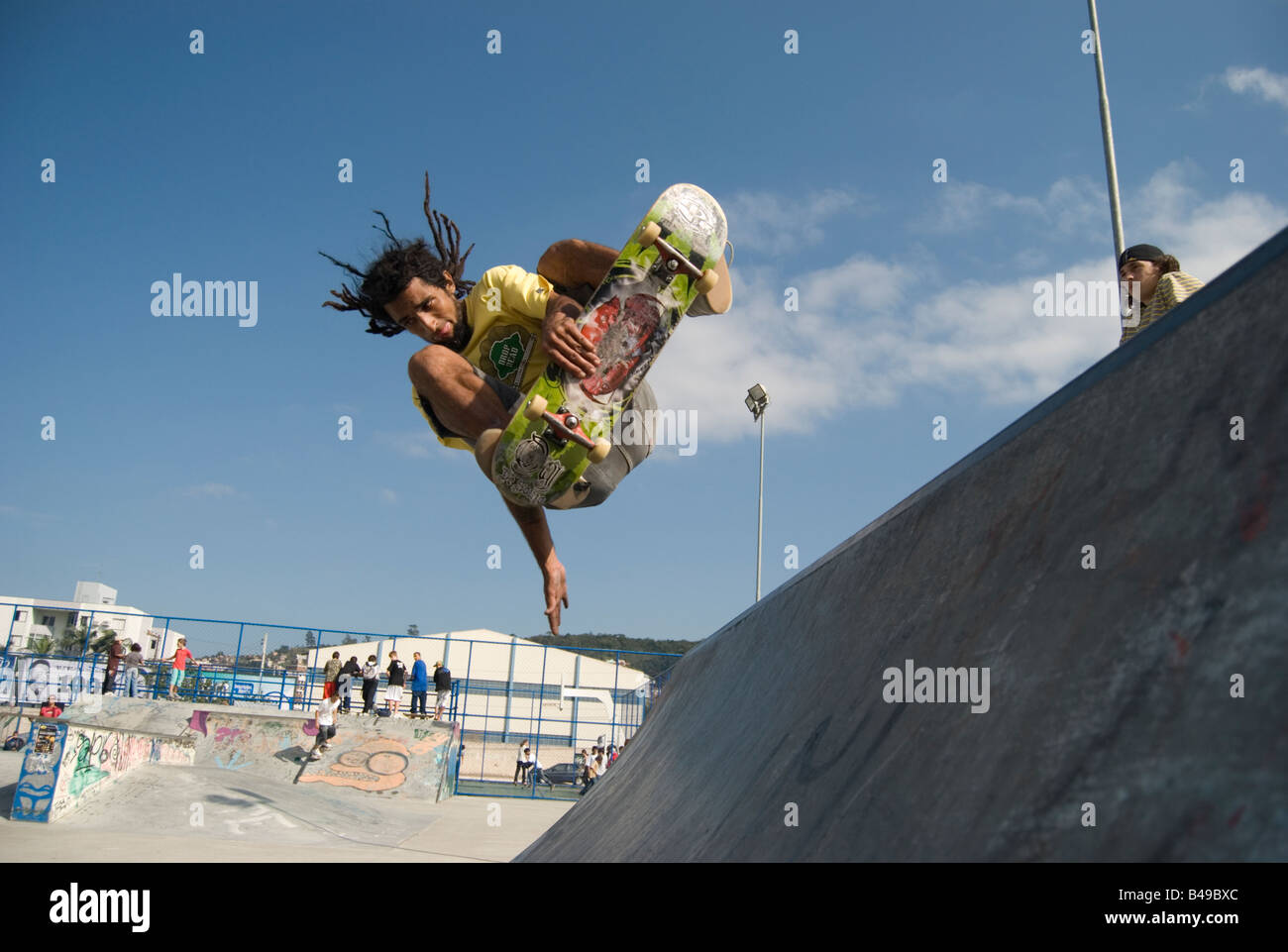 A young man practice skate boarding in a public park Florianopolis Brazil Stock Photo
