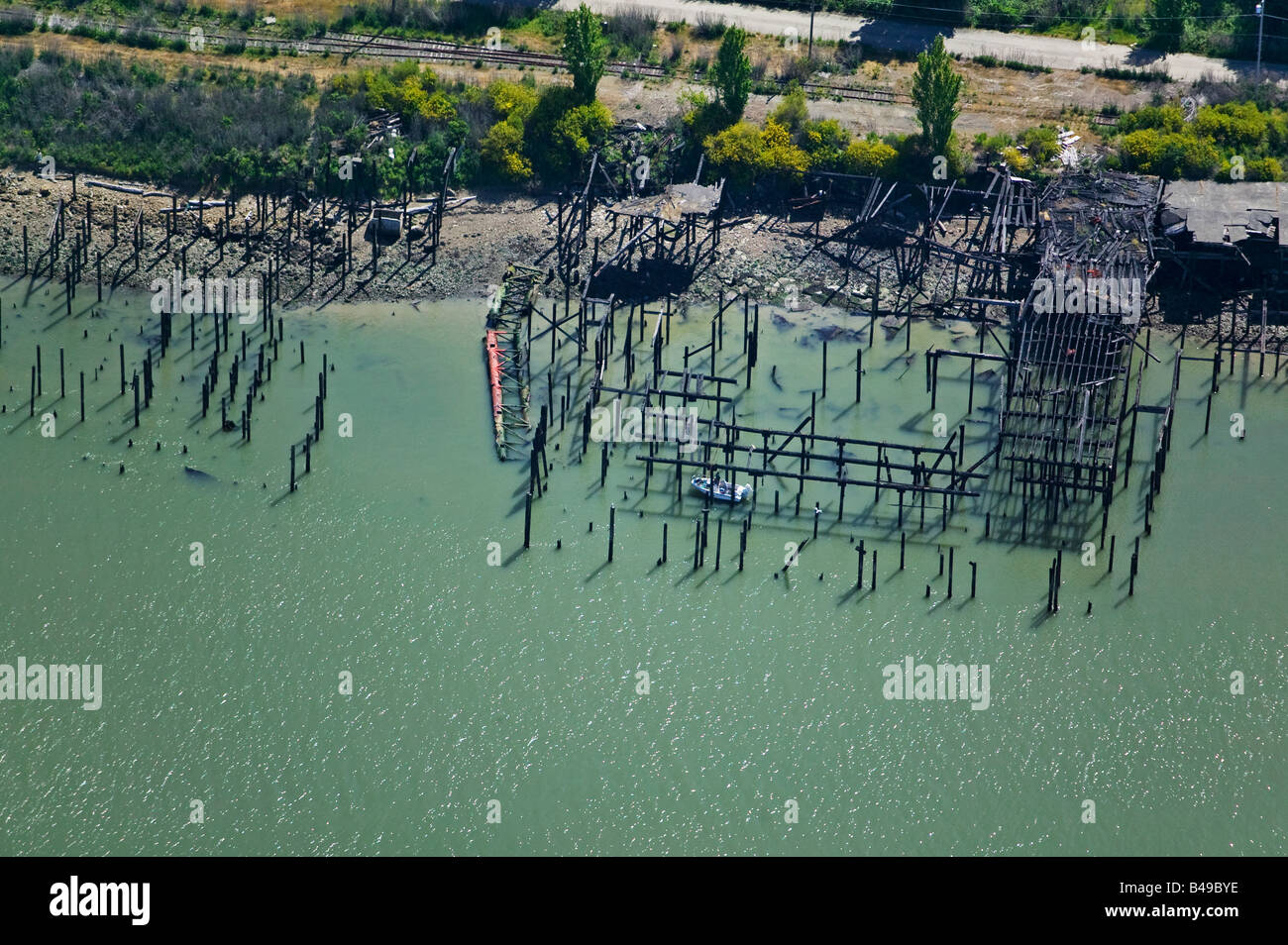 aerial above dilapidated abandoned pier Richmond, CA San Francisco bay Stock Photo