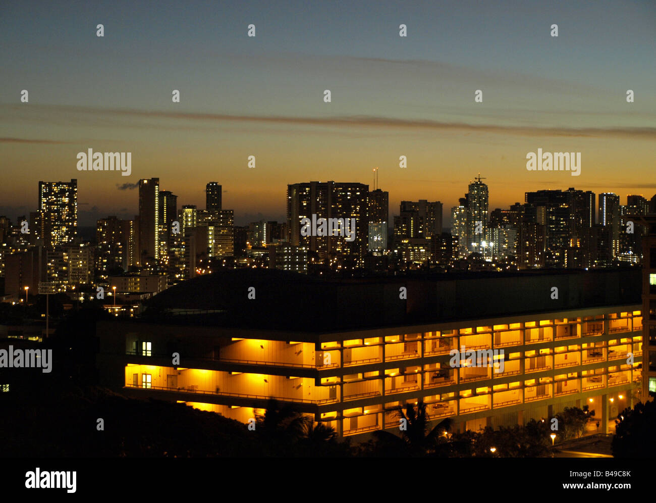Waikiki skyline at dusk, from the University of Hawaii campus Stock