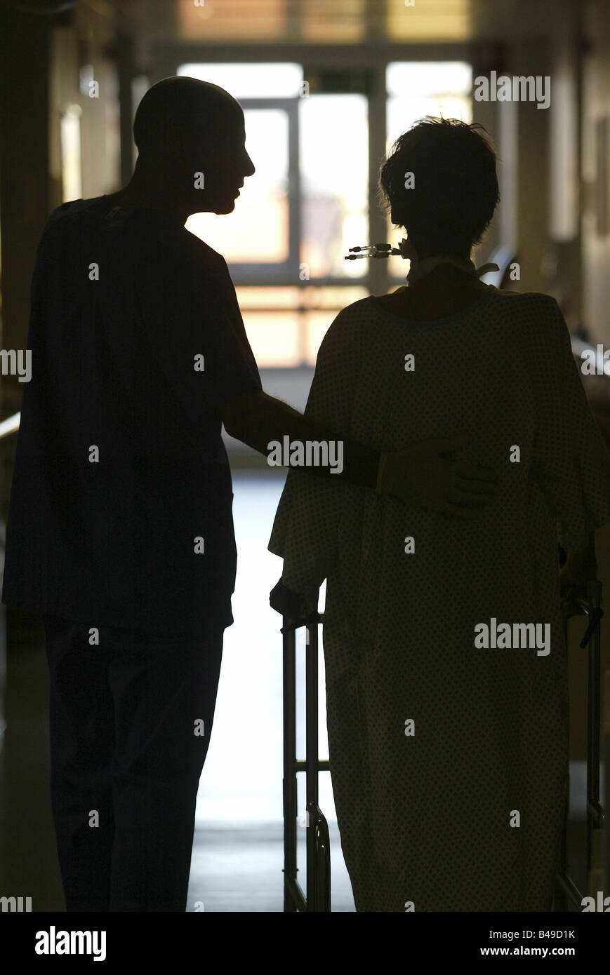 Silhouettes of male nurse and patient Stock Photo Alamy