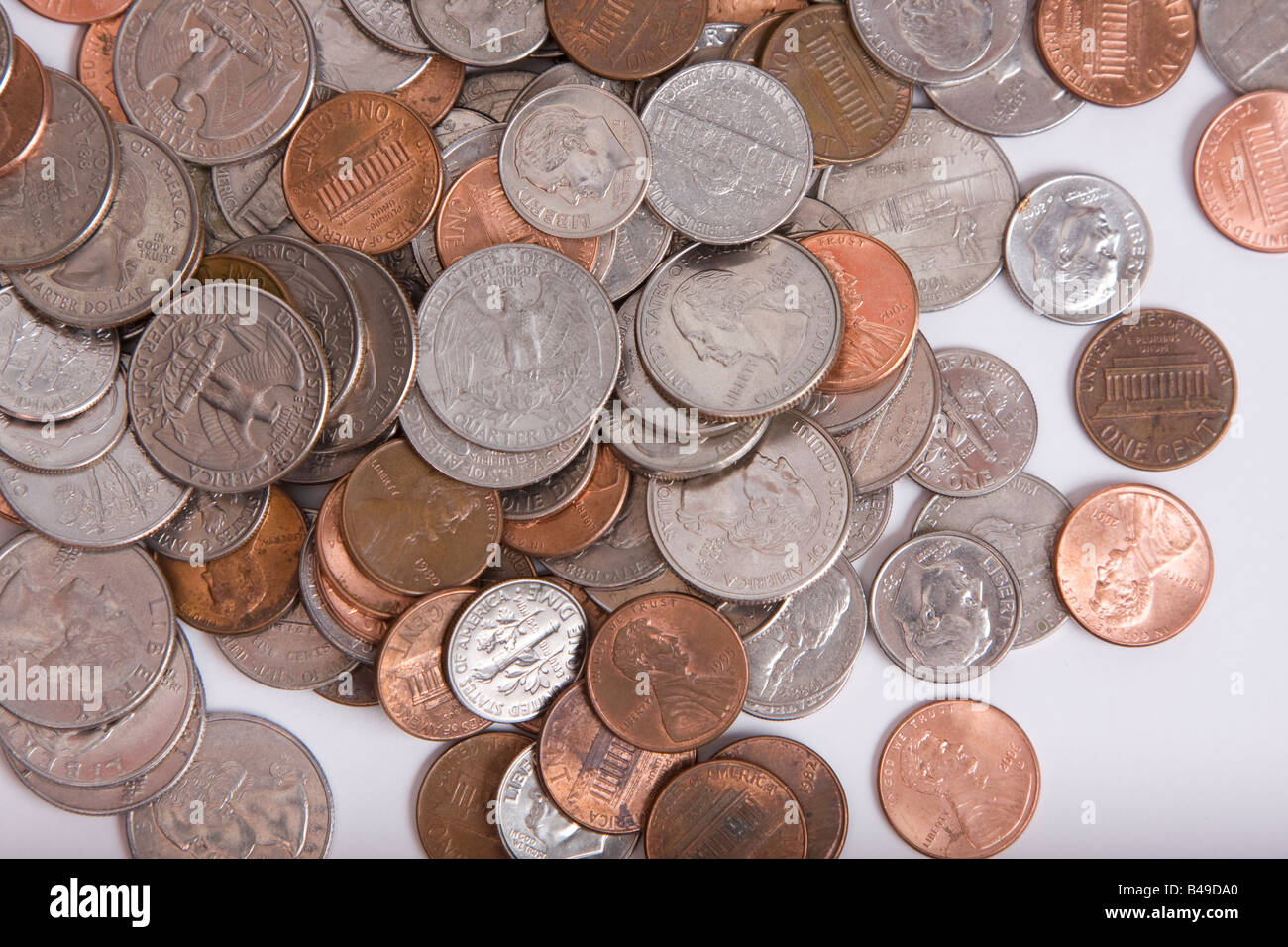 loose USA coin money on a white backdrop Stock Photo Alamy