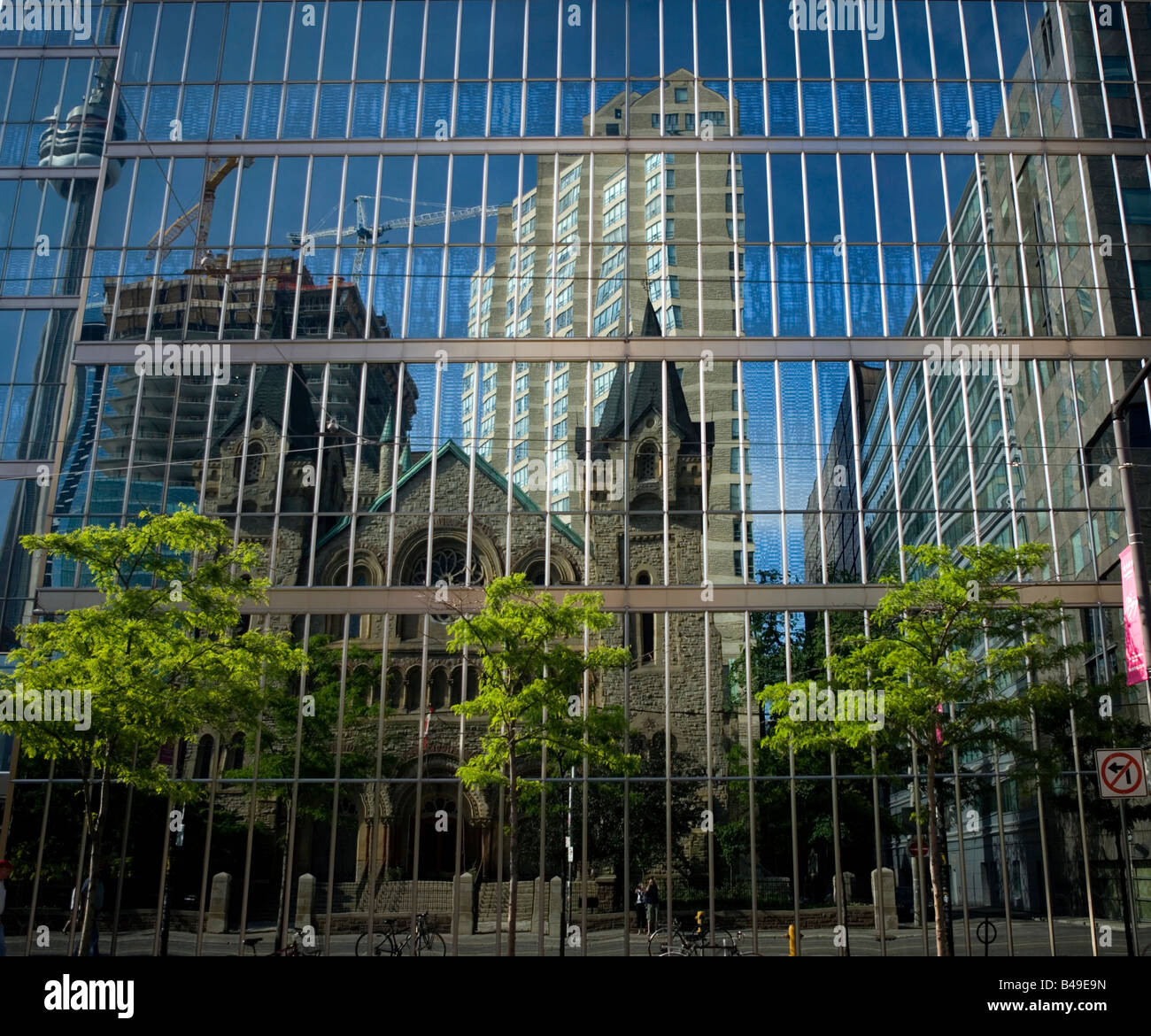 Toronto city skyline reflected in glass skyscraper, Ontario, Canada Stock Photo