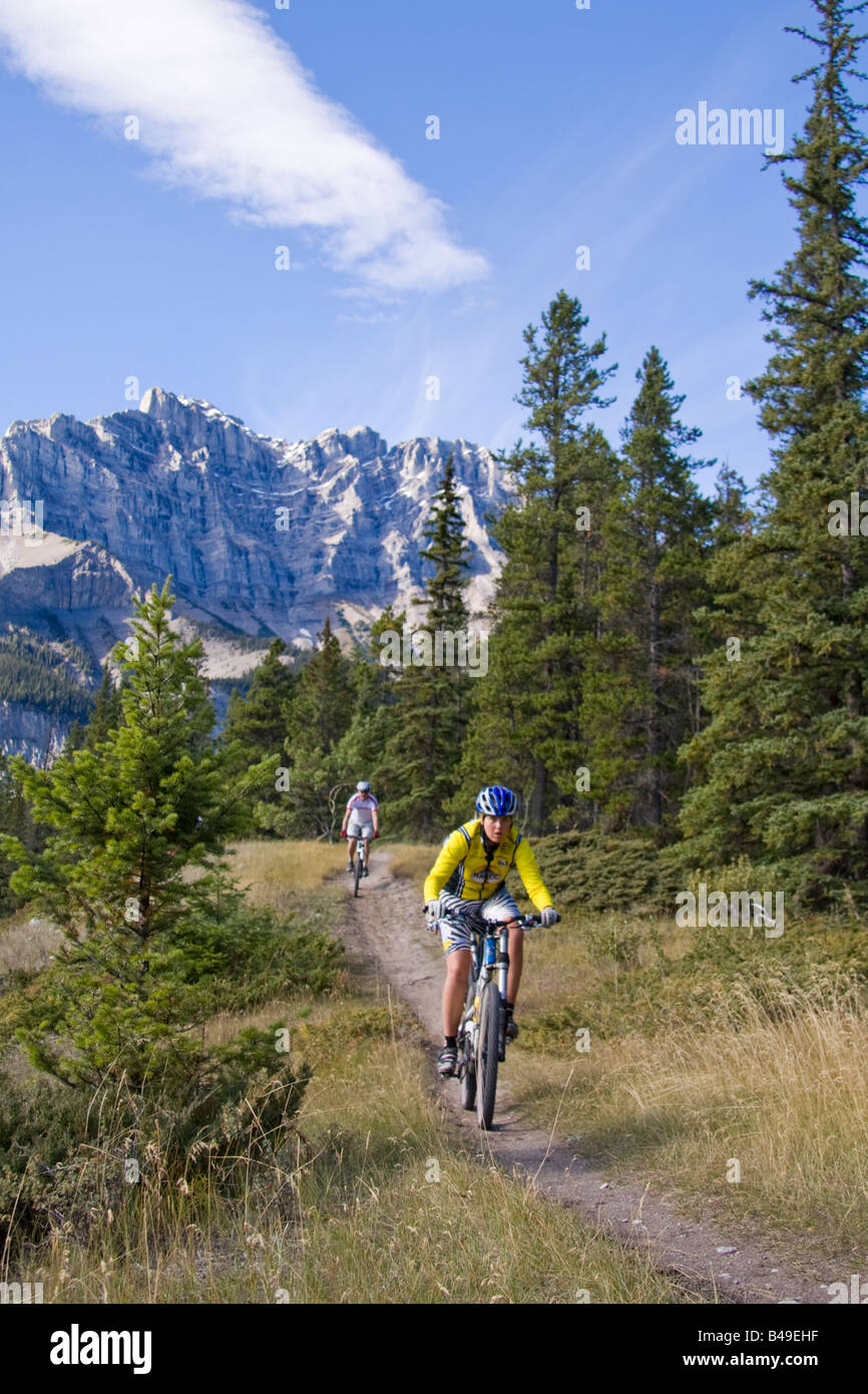 Mountain biking on a trail near Banff, Alberta, Canada Stock Photo