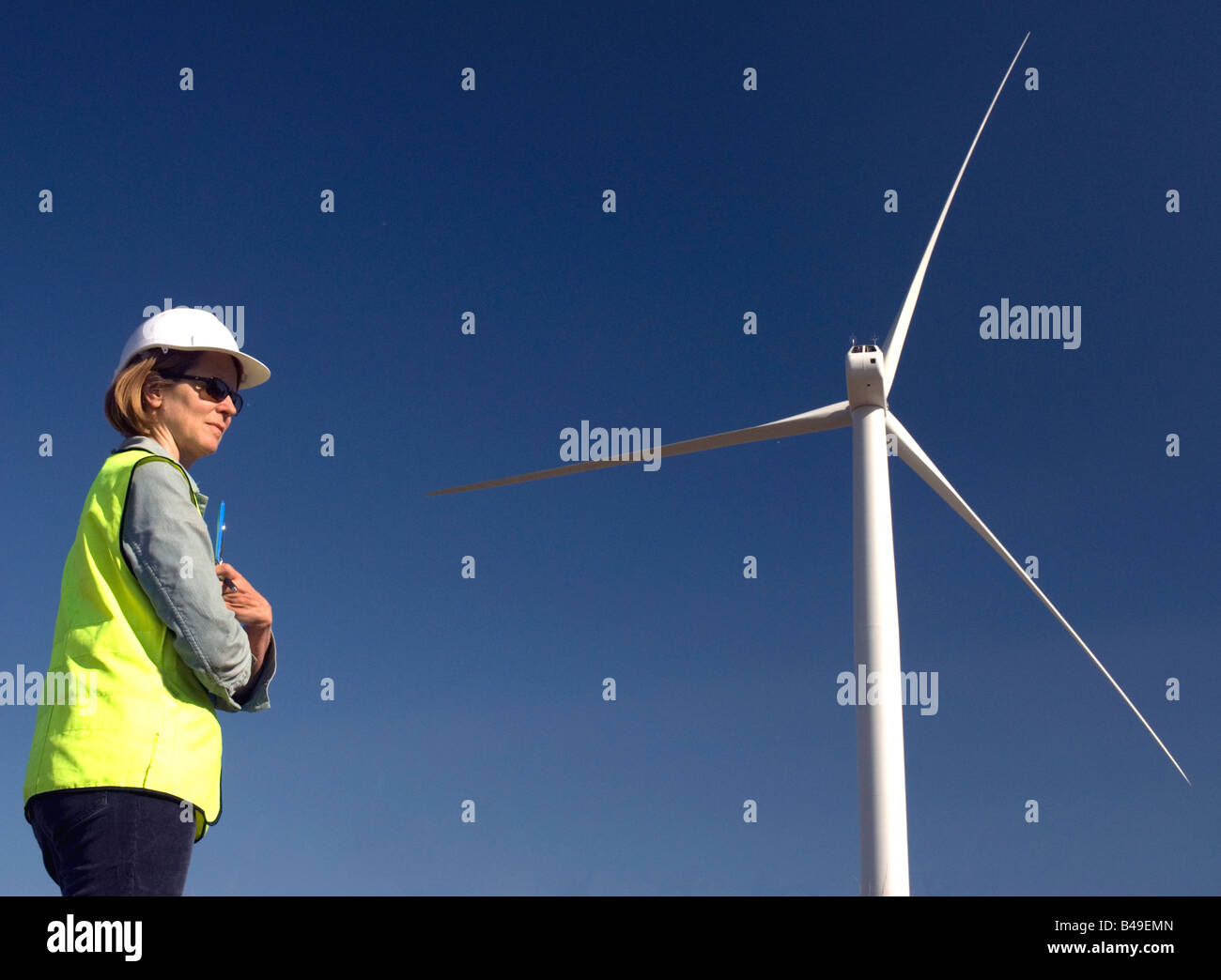 Female engineer at wind turbine wind farm Stock Photo Alamy
