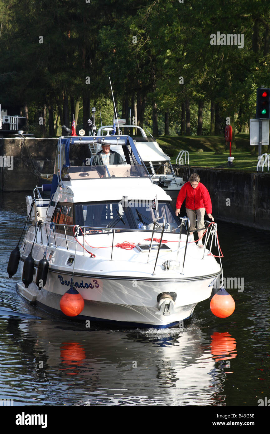 A cabin cruiser on the River Trent at Gunthorpe Lock, Gunthorpe, Nottinghamshire, England, U.K. Stock Photo