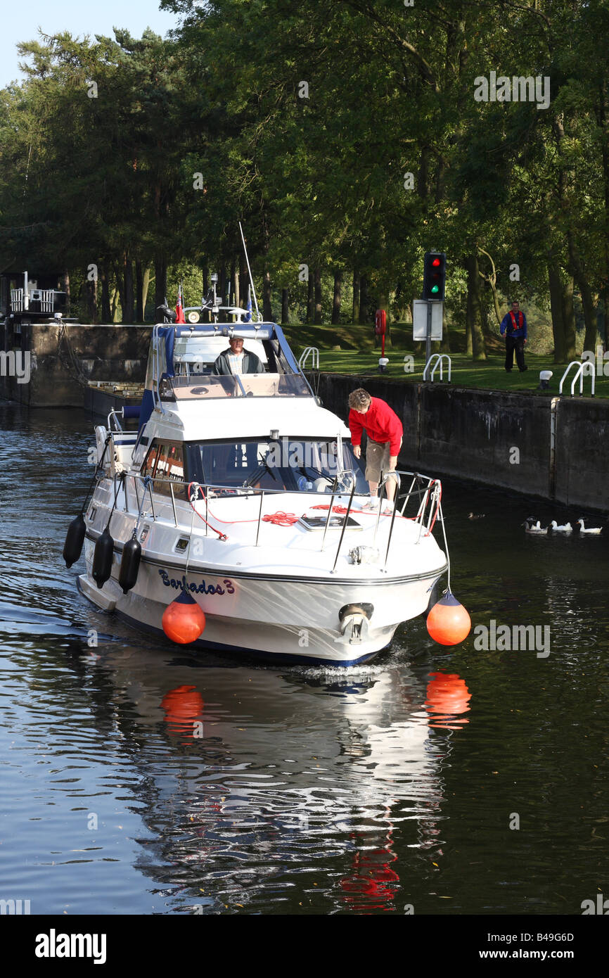 A cabin cruiser on the River Trent at Gunthorpe Lock, Gunthorpe, Nottinghamshire, England, U.K. Stock Photo