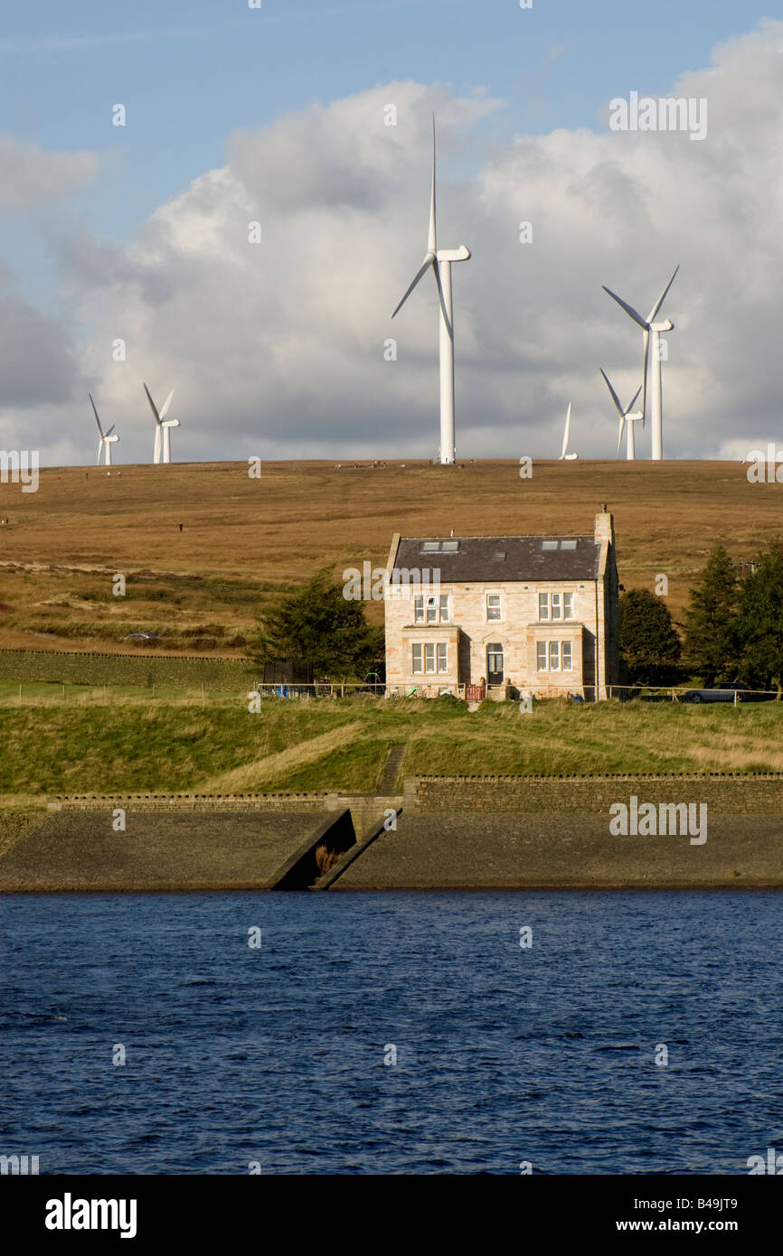 Wind turbines on Scout Moor, Ashworth Reservoir and house, summer, Lancashire, UK.  (Mixed northern upland land uses) Stock Photo
