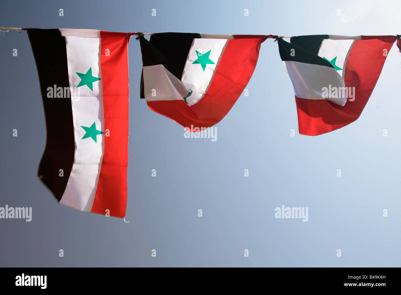 Syrian flags Stock Photo
