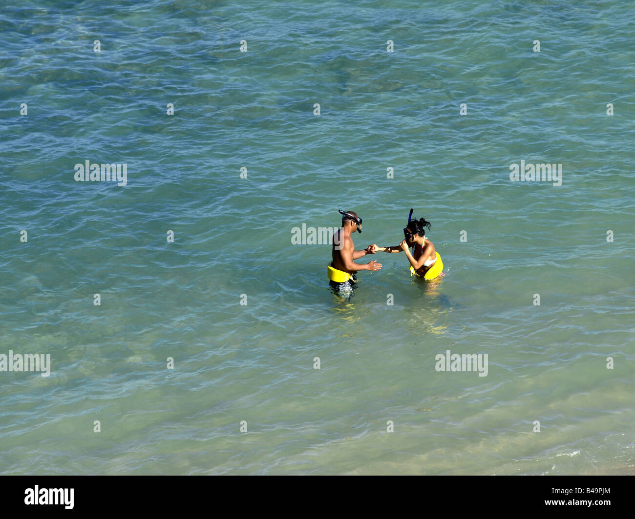 couple snorkeling in Hawaii Stock Photo