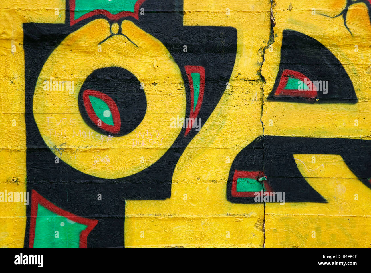Inner city background with colorful graffiti Stock Photo