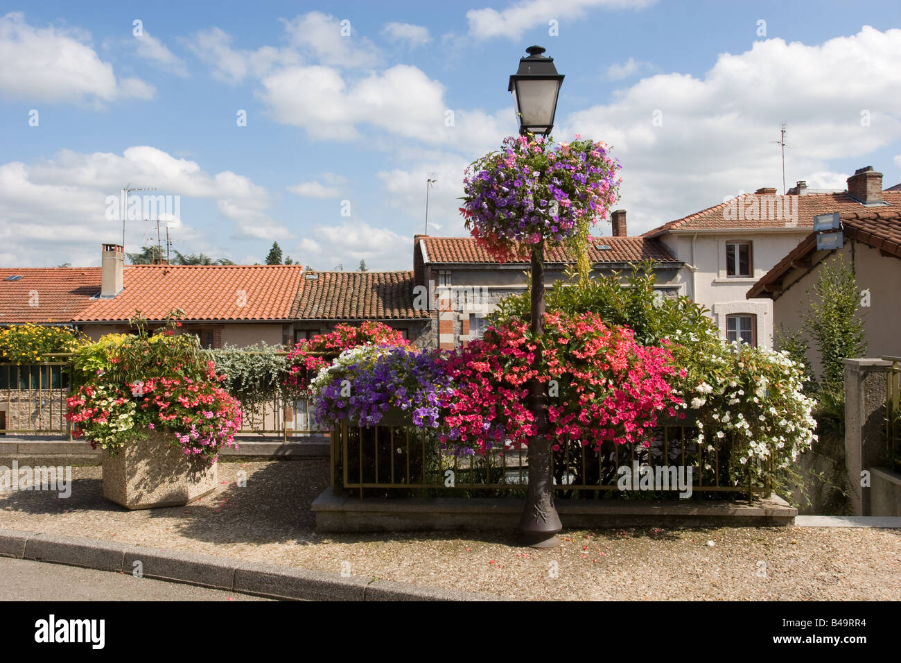 Flower displays in streets of Saint Galmier hilltop town in the Loire region of France Stock Photo