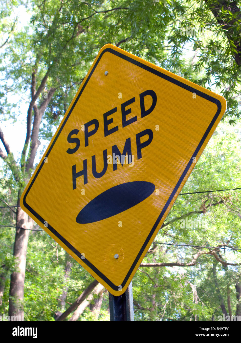 Warning sign for speed hump on a road, Washington, DC, USA Stock Photo