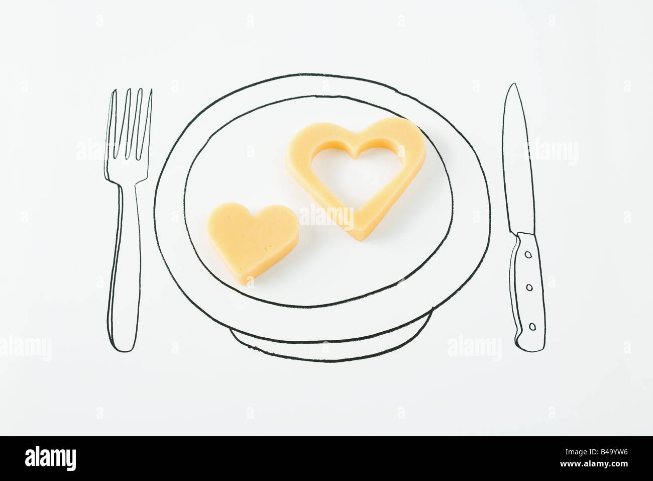 Heart-shaped cheese on drawing of plate Stock Photo