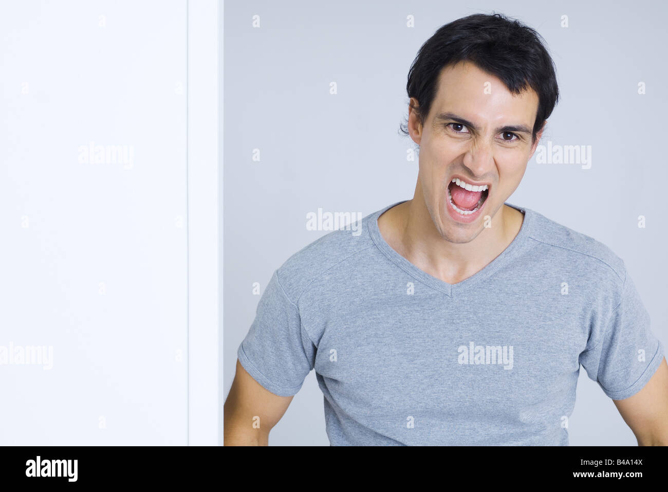 Man shouting at camera, portrait Stock Photo