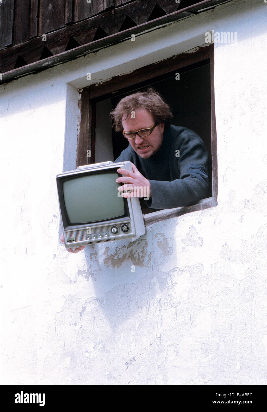 broadcast, television, viewers, angry man drop TV set out of a window, Germany, Additional-Rights-Clearance-Info-Not-Available Stock Photo