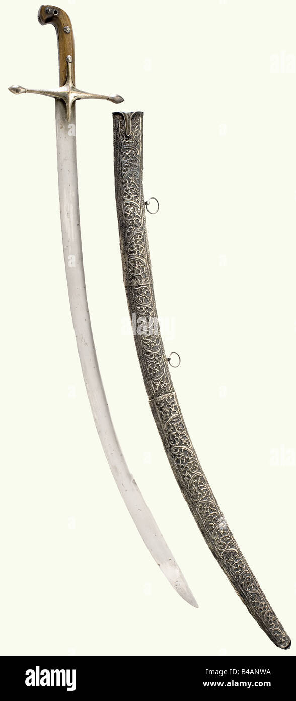 An Ottoman silvermounted kilij, circa 1800. Curved singleedged blade