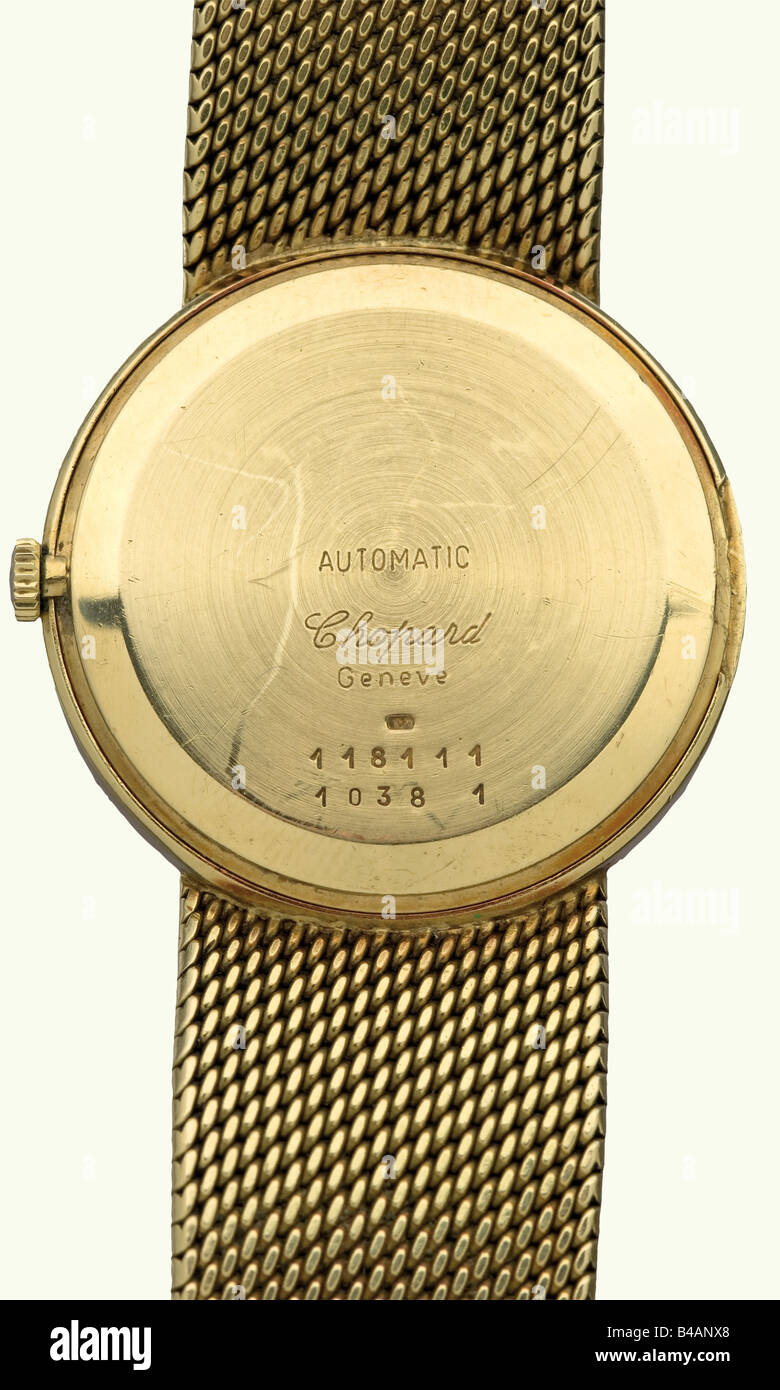 King Faisal Ibn Abdul Aziz al-Saud (1906 - 1975)., A golden presentation wrist watch, Geneva, circa 1970. Chopard automatic watch with sapphire crystal and golden wrist strap. The gold dial bears the of King Faisal. A 750 gold hallmark stamped on the clasp. Works are intact. Length 20 cm. Weight 93.5 grams. historic, historical, 1960s, 1970s, 20th century, Ottoman Empire, object, objects, stills, clipping, clippings, cut out, cut-out, cut-outs, clock, clocks, watch, watches, timepiece, Stock Photo