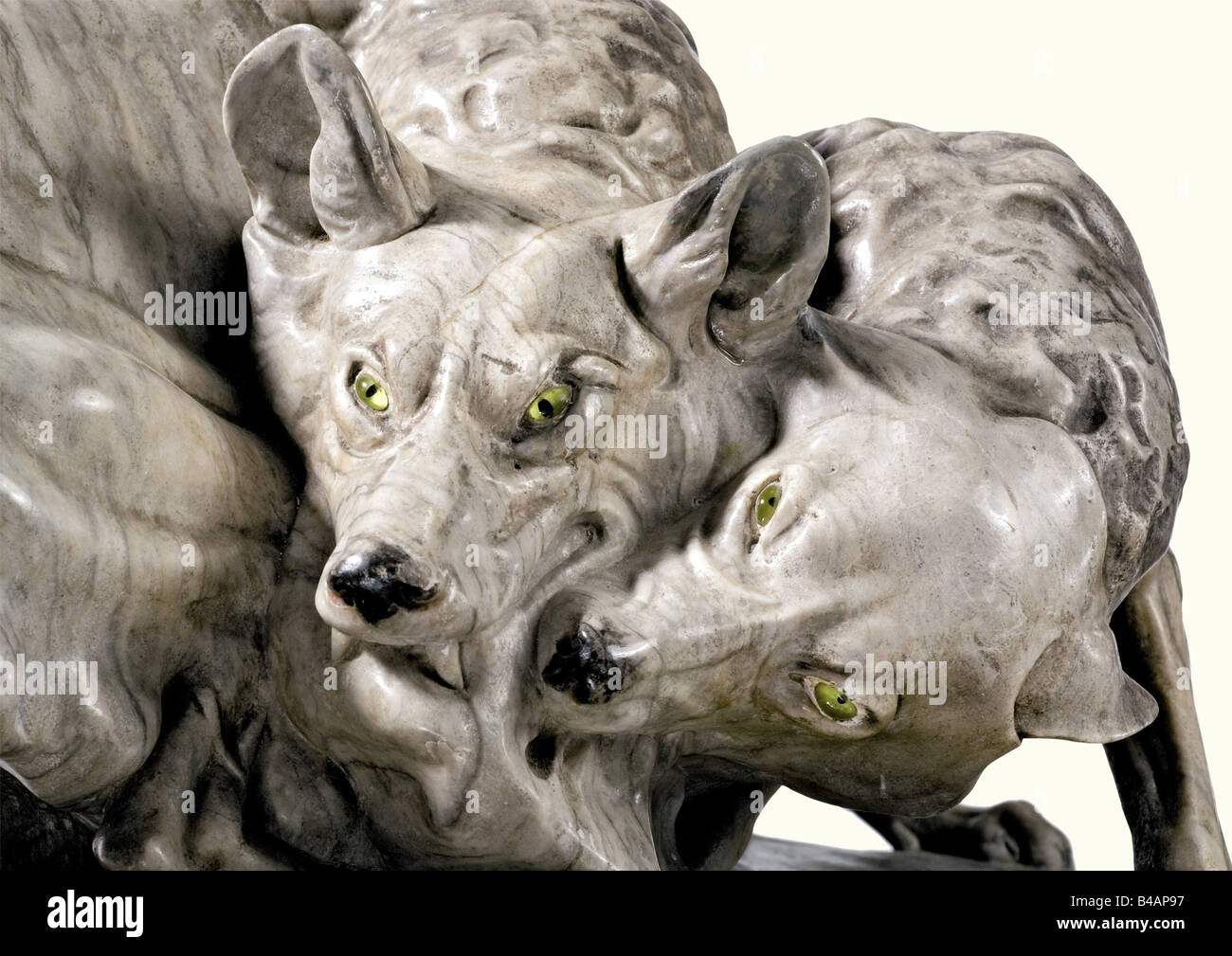 Otto Pilz (1876 - 1934), 'Two fighting wolves' Sculpture made of grey, streaked marble, originally created for the entrance hall of the sanatorium Meersburg. Very detailed work hewn from a single piece of marble, inset glass eyes, with coloured claws and mouths, the oval plinth signed 'O. Pilz'. Slightly bumped, but no major chips. On further marble panel. Height 26 cm, length 38 cm. Otto Pilz was a Dresden animal sculptor and studied at the School of Applied Arts in Dresden and at the Berlin Academy of Arts under Begas, Breuer and Eberlein. Apart fro, Artist's Copyright has not to be cleared Stock Photo