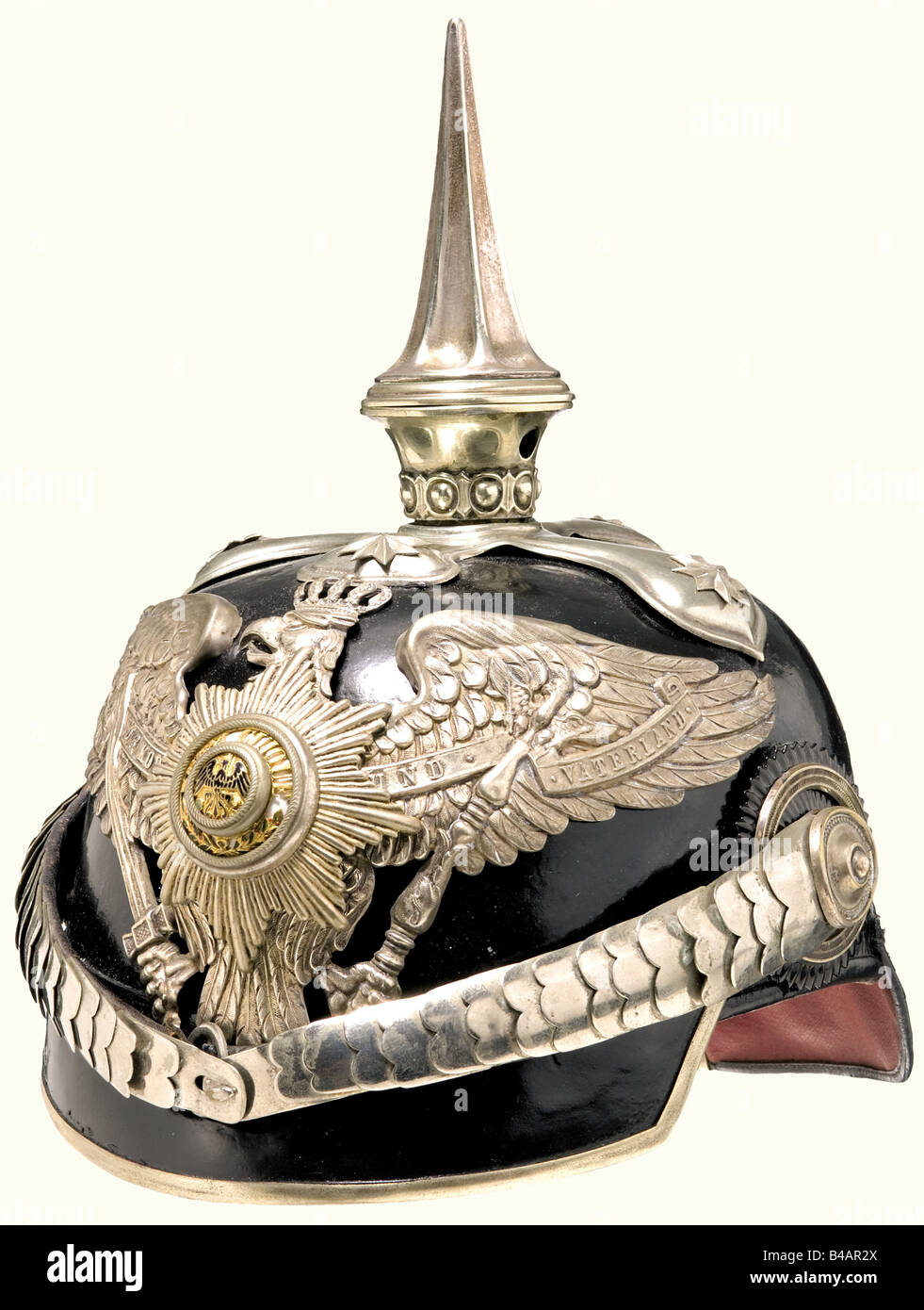 A model 91 helmet, for supernumerary generals Leather skull with silver mountings, fluted spike on a cross base, stars and plate with an enamelled star. Nickel-plated convex metal chinscales on rosette pins. Officer's cockade. Skull has been relacquered, and the mountings replaced with double holes. The cross is broken off the eagle's crown. Spike loose. Sweatband and ribbed silk lining torn. historic, historical, 19th century, Prussian, Prussia, German, Germany, militaria, military, object, objects, stills, clipping, clippings, cut out, cut-out, cut-outs, helm, Stock Photo