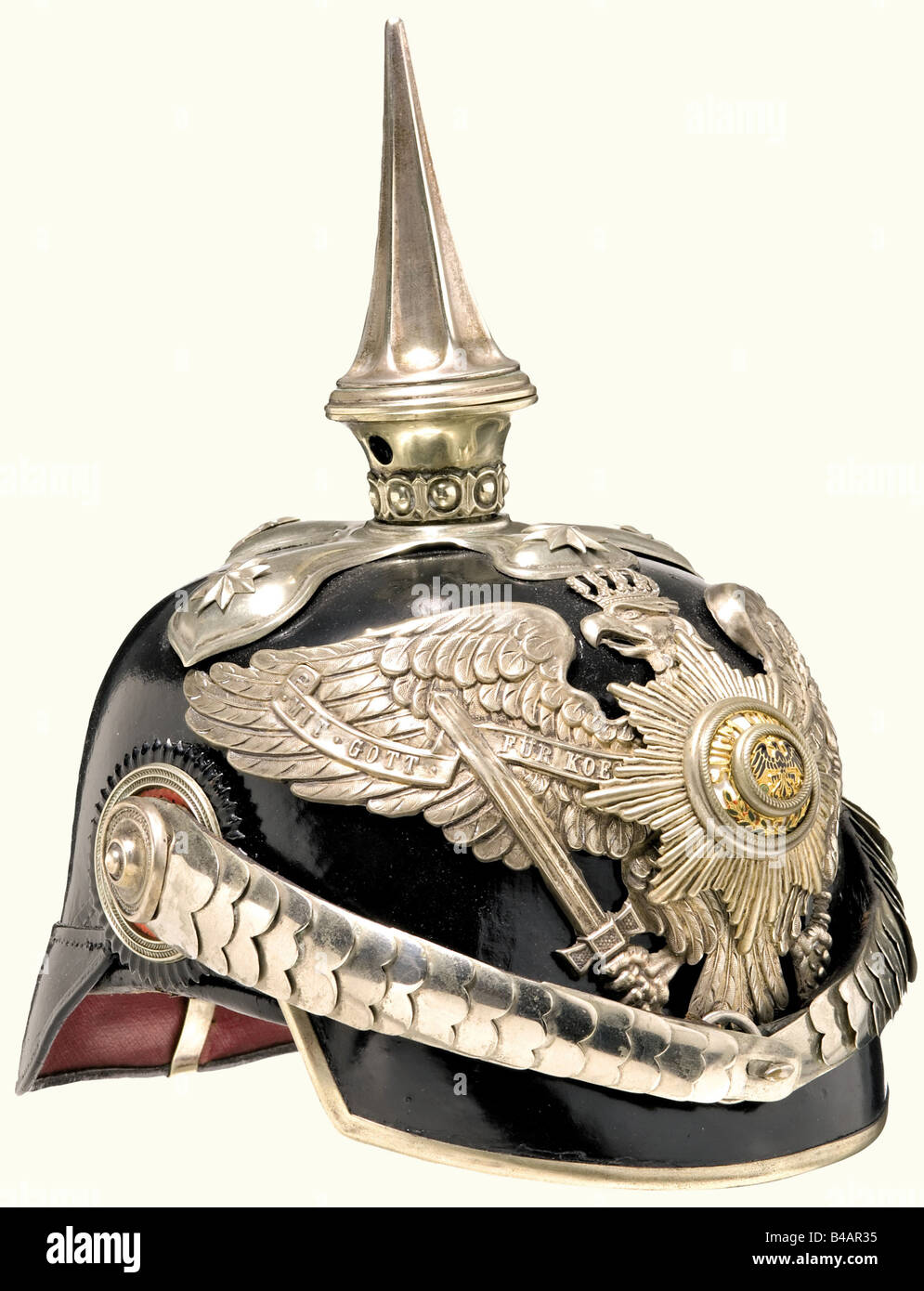 A model 91 helmet, for supernumerary generals Leather skull with silver mountings, fluted spike on a cross base, stars and plate with an enamelled star. Nickel-plated convex metal chinscales on rosette pins. Officer's cockade. Skull has been relacquered, and the mountings replaced with double holes. The cross is broken off the eagle's crown. Spike loose. Sweatband and ribbed silk lining torn. historic, historical, 19th century, Prussian, Prussia, German, Germany, militaria, military, object, objects, stills, clipping, clippings, cut out, cut-out, cut-outs, helm, Stock Photo