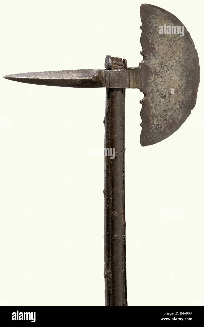 A German or Italian battle axe, circa 1520. Semicircular blade with cut