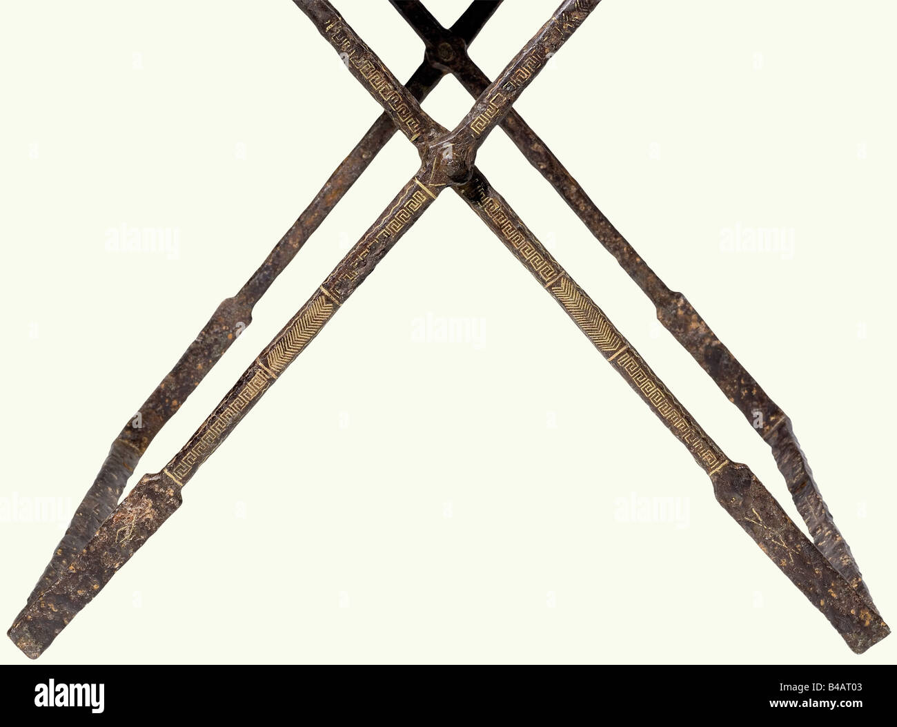 A folding iron chair for a Field Commander, Late Roman/Early Byzantine, 3rd - 4th century A.D. Iron with fine bronze and silver inlay. Folding frame of square bars, with the supporting sides and the upper edges becoming rectangular in section. On each side of the top there are five ring fittings to accept the passage of iron bars to attach the (replacement leather) seat. There are remnants of the bronze decorative inlay on the sides, with meanders, angles, and wave or historic, historical, ancient world, ancient world, ancient times, object, objects, stills, cl, Stock Photo