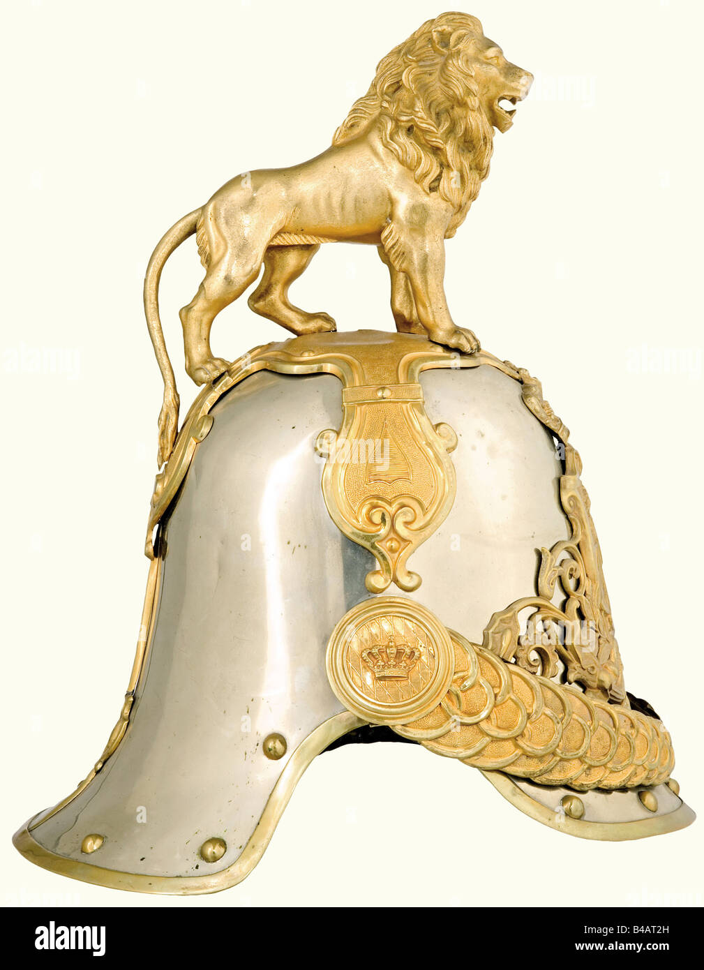 A helmet of 1852 pattern for the Archers Life Guard., In the court gala version with the standing, gold plated lion. Nickel-silver skull with fire-gilded tombac fittings, broad metal chinscales on crown rosettes. The lion has the part number '6' on the rear leg. Original leather lining (damaged). The part number '6' is soldered into the rear peak. Crack, visible only from the inside of the skull. Rare helmet. historic, historical, 19th century, Bavaria, Bavarian, German, Germany, Southern Germany, the South of Germany, object, objects, stills, militaria, clippi, Stock Photo