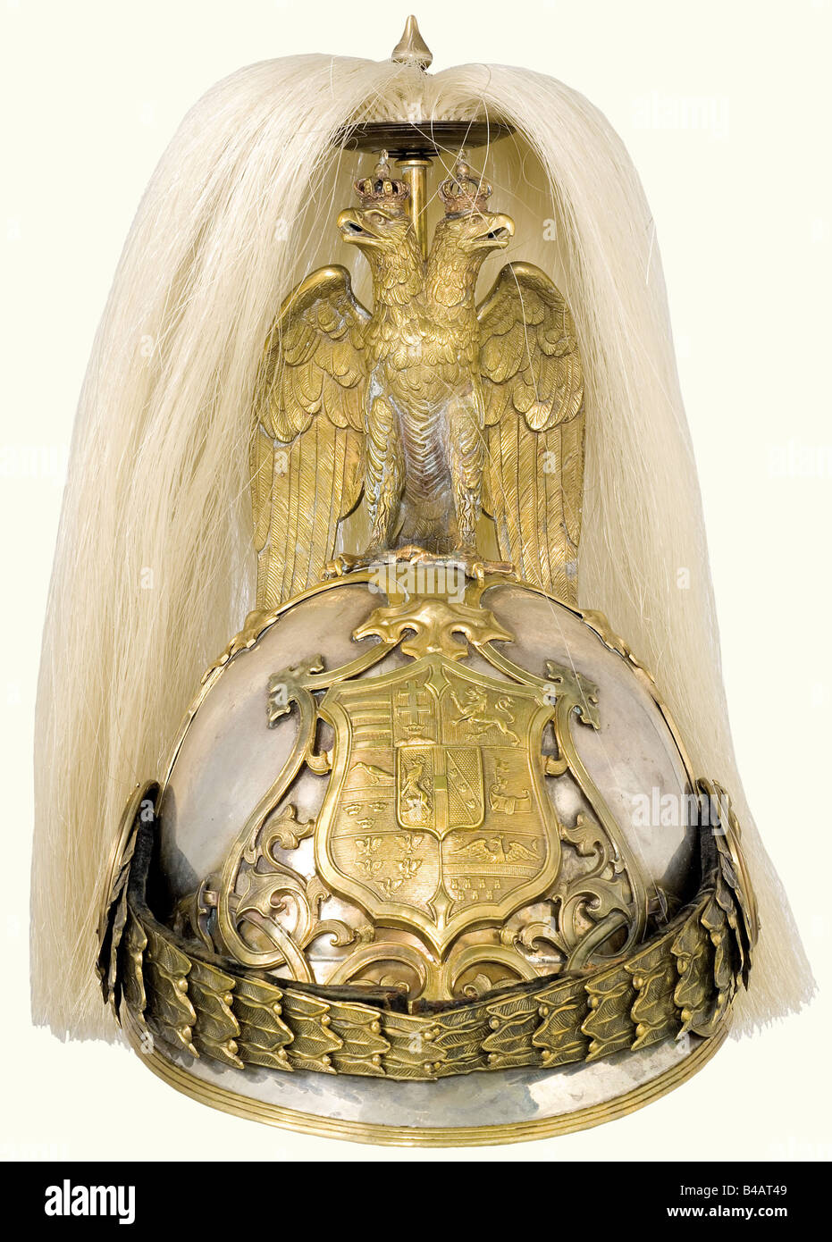 A helmet for the k.u.k First Arcieren Life Guards, according to the 1905 regular for equipment and uniforms of the First Arcieren Life Guards. Silver skull, with incomplete Diana head's silver hallmark (800), the master's mark 'HS' on the nape. Armoury stamps 'N31' and '37D'. The bronze, crowned double eagle and the beautifully worked mountings are fire-gilded with abrasions in places. The metal chinscales are backed with black velvet. Black coloured silk lining, artificial leather sweatband. White horse hair plume to be mounted behind the neck of the double ea, Stock Photo