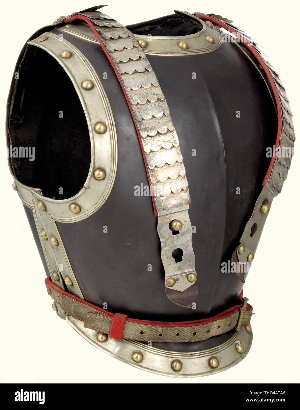 A cuirass for an officer, of the Line Cuirassiers. Very light version in blackened sheet iron with nickel-silver trim on the edges. Silver plated scale straps on red cloth backing. The stomach band is lined with red and set with silver lace. A few small cracks in the edging. historic, historical, 19th century, uniform, uniforms, piece of clothing, clothes, outfit, outfits, plating, armour-plating, armour, armor, reactive armour, cuirass, metal, protection, defensive arms, equipment, equipments, object, objects, stills, clipping, clippings, cut out, cut-out, cut, Stock Photo