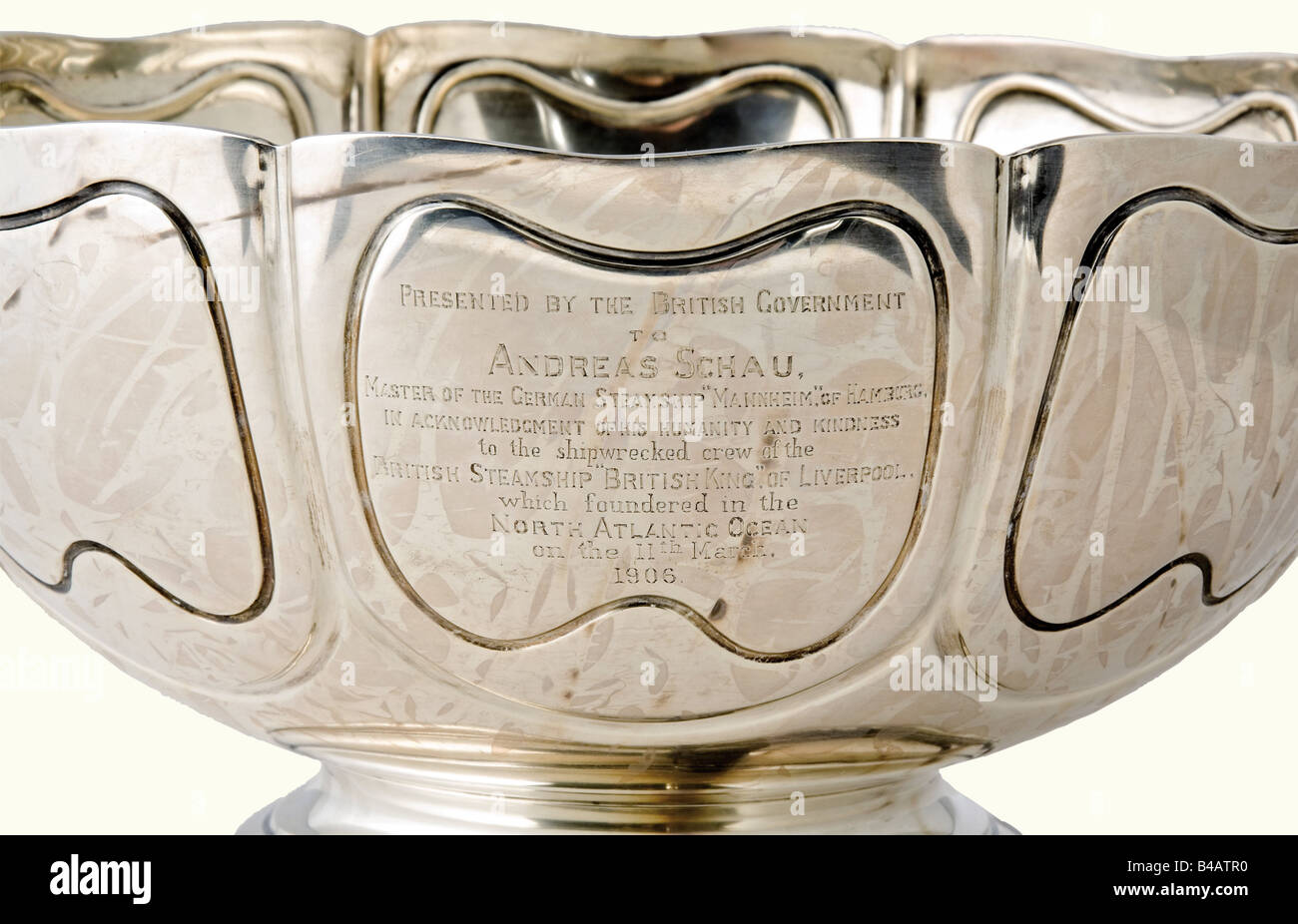 Andreas Schau - a large silver dish., A Present of the British government for the rescue of the crew of the sunken steamship 'British King' from Liverpool, which was in distress in the North Atlantic on 11th March 1906. Andreas Schau was the captain of the German steamship 'Mannheim' from Hamburg. In the front the engraved dedication 'Presented by the British Government to - Andreas Schau - Master of the German steamship 'Mannheim' of Hamburg in acknowledgement of humanity and kindness to the shipwrecked crew of the British steamship 'British King' of Liverpool, Stock Photo