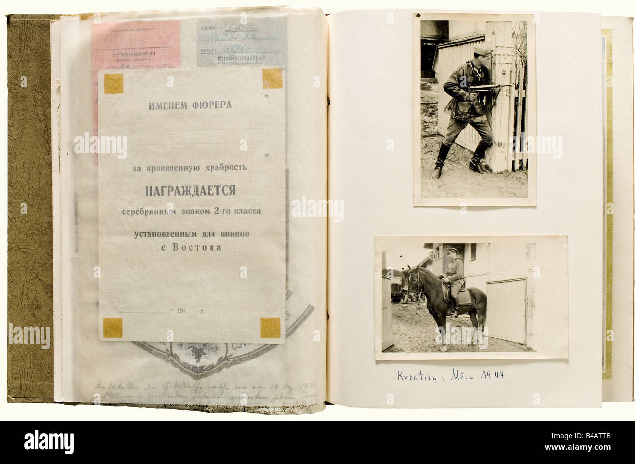 Photo Albums of First Lieutenant Sander in the 1st Don Cossack Cavalry Regiment., Assembled and notated by his brother after the war (Sander fell in April 1945) with numerous newspaper clippings, leave passes, identity documents, letters and so forth. Included are the award documents for the Ostvolk Bravery Medal 2nd Class in Silver (2 December 1943, original signature v. Pannwitz, the blank reverse in Cyrillic), the Iron Cross 2nd Class of 1939 (16 November 1943, original signature Dehner), the General Assault Badge (10 August 1944), the Wound Badge in Black (, Stock Photo