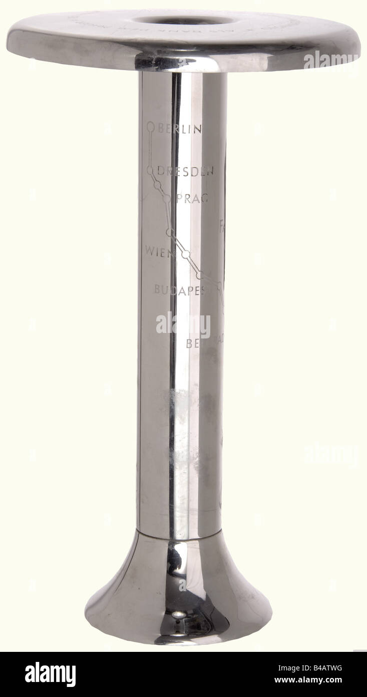An Olympic torch holder 1936, with certificate for participants. Nicely preserved torch holder made by Krupp AG, Essen from stainless V2A steel with etched decoration. Height 27 cm. The participant's certificate issued to the Yugoslavian relay bearer, Ivan Molnar, with the stamp of the Yugoslavian NOC (National Olympic Committee). historic, historical, 1930s, 20th century, Olympic Games, Olympics, Olympiad, sports, tournament, tourney, tournaments, tourneys, object, objects, stills, clipping, clippings, cut out, cut-out, cut-outs, Stock Photo