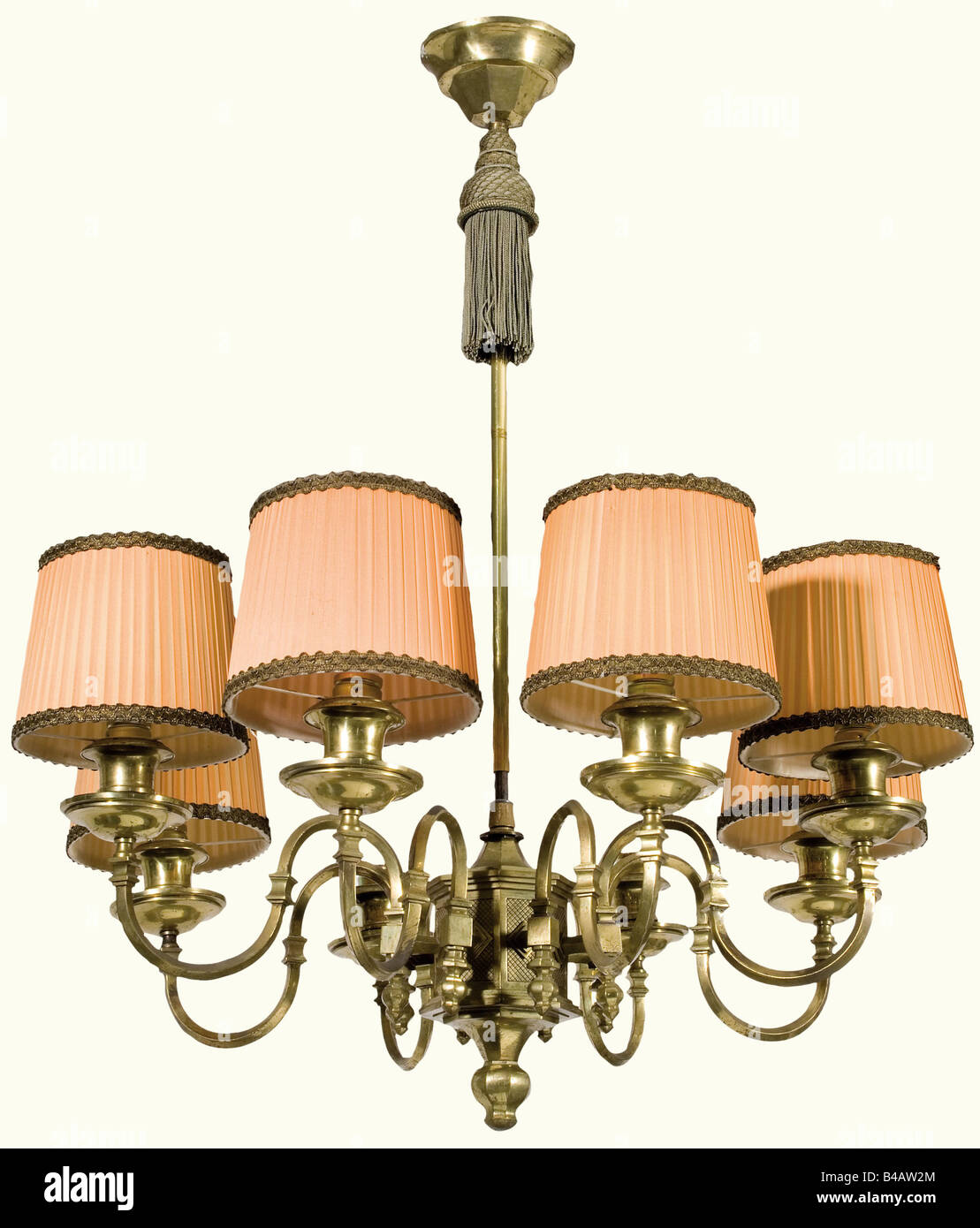 Paul Ludwig Troost und Leonhard Gall - a large ceiling chandelier, from the Führer Building on the Königsplatz in Munich. Brass. The heavy octagonal centrepiece with eight mounted arms with light fixtures and salmon-coloured lampshades (two missing). Complete with ceiling attachment, the cables replaced. Height approx. 100 cm, Diameter 76 cm. The Führer Building and the Administration Building of the NSDAP were built according to the plans of the Munich architect Paul Ludwig Troost (1878 - 1934), who was Hitler's favorite architect before Speer. He did not live, Stock Photo