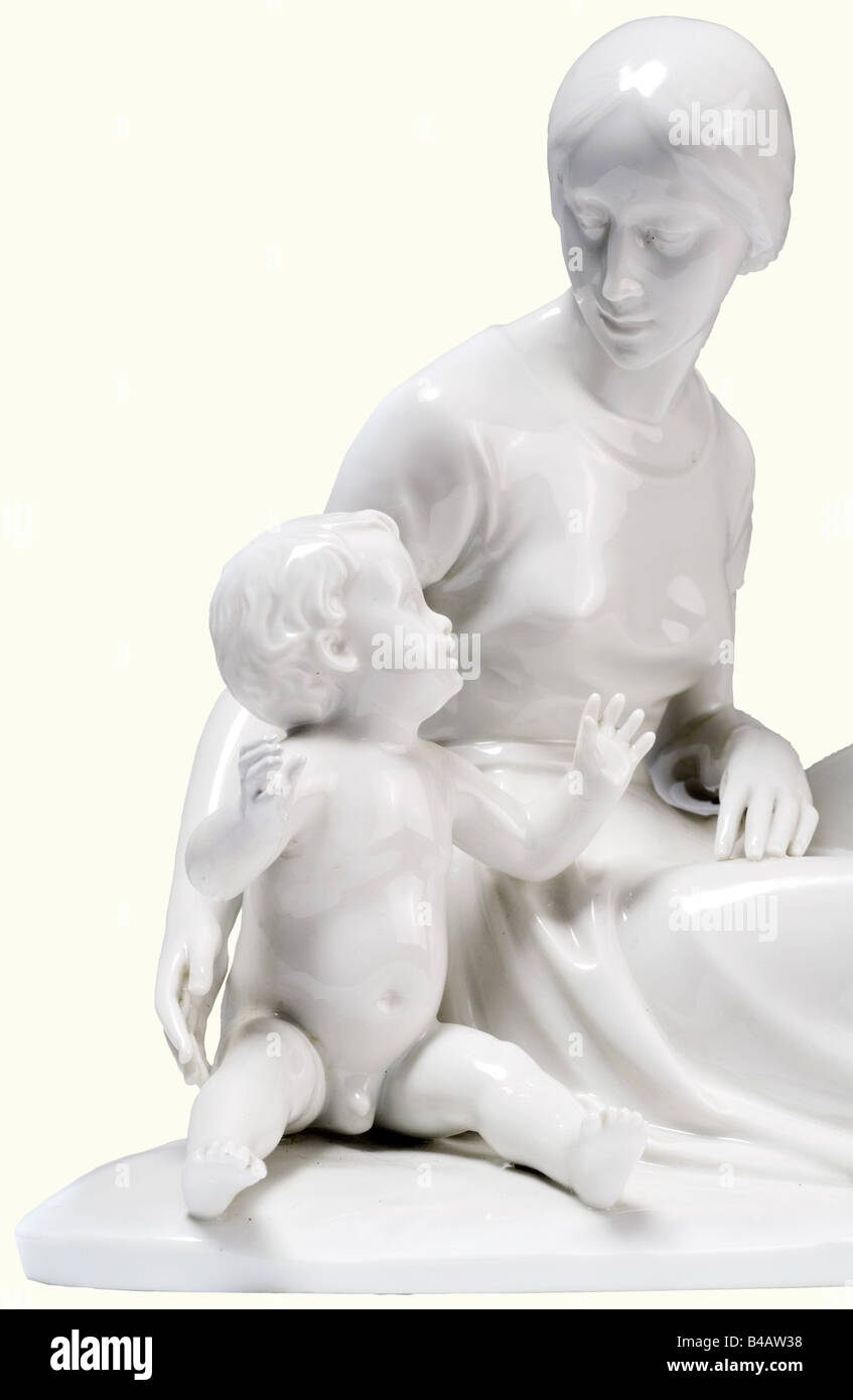 Mother and child., White porcelain figurine. Base with artist's signature 'P. Horn', green underglaze manufactory mark and model number '98'. Right hand of the child restored, otherwise unchipped, extremely decorative and very rare figurine. Height 22 cm.' fine arts, people, 1930s, 1930s, 20th century, object, objects, stills, clipping, clippings, cut out, cut-out, cut-outs, Additional-Rights-Clearance-Info-Not-Available Stock Photo