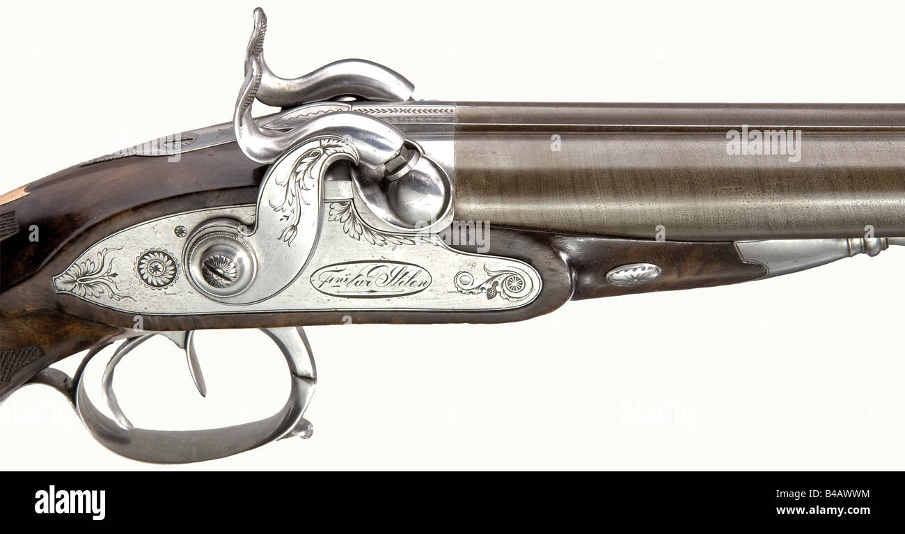 A pair of double-barrelled percussion pistols, Stelen at Paris, circa 1820. Browned twist Damascus barrels with smooth bores in 17 mm calibre. Nicely converted locks, signed, 'Fini Par Stelen - Paris'. Beautifully figured walnut half stocks with fine checkering and red gold escutcheons. Lightly engraved iron furniture. But caps with nipple containers. Iron ramrods with brass tips. Length of each 33 cm. Erwerbsscheinpflichtig. historic, historical, 19th century, civil handgun, civil handguns, handheld, gun, guns, firearm, fire arm, firearms, fire arms, weapons, , Stock Photo