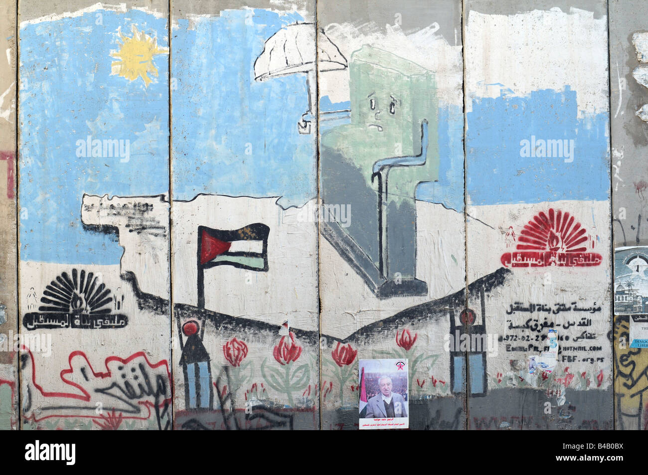 A painting on the controversial 'security fence', a wall built by the Israelis to separate themselves from the Palestinians. Stock Photo