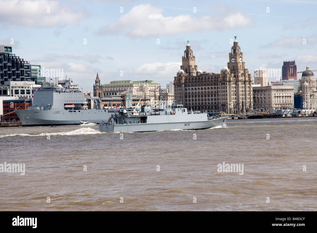 HMS Grimsby sailing up the Mersey with Liverpool and the Liver Building ...