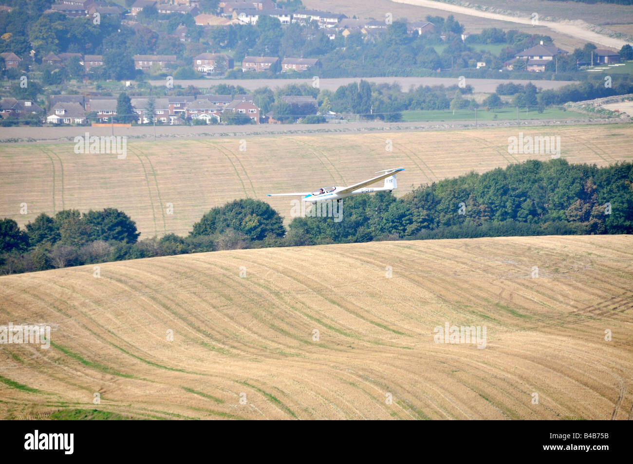 Glider flying over crop fields Dunstable Downs England Stock Photo Alamy