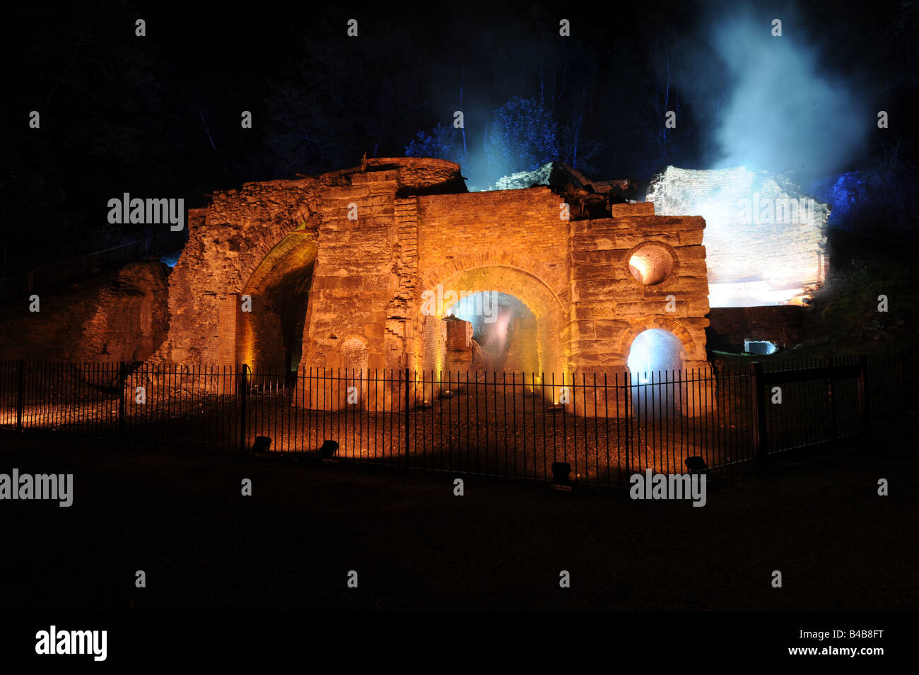 The remains of Bedlam Furnaces at Ironbridge in Shropshire floodlit for the World Heritage Festival Stock Photo