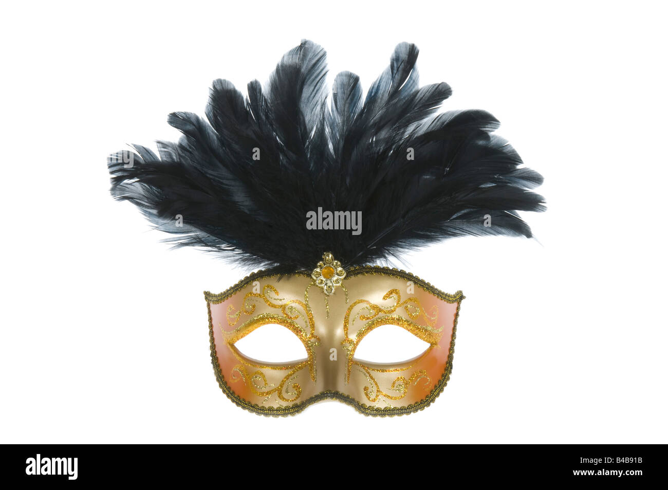 A typical gold Venetion carnival eye mask on a pure white (255) background. Stock Photo