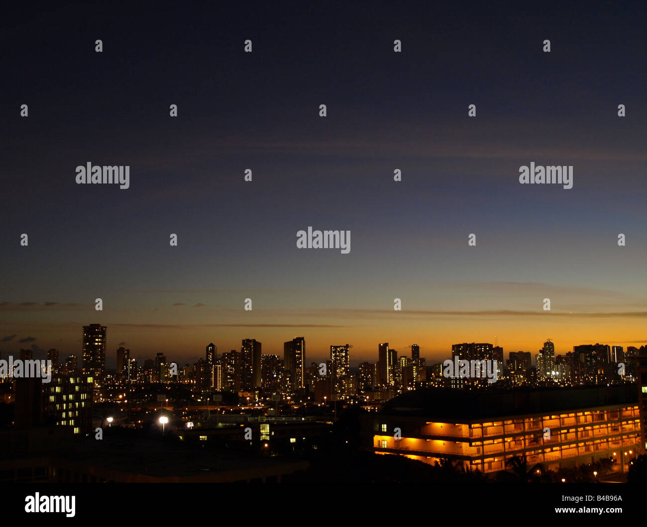 Waikiki skyline at dusk, from the University of Hawaii campus Stock