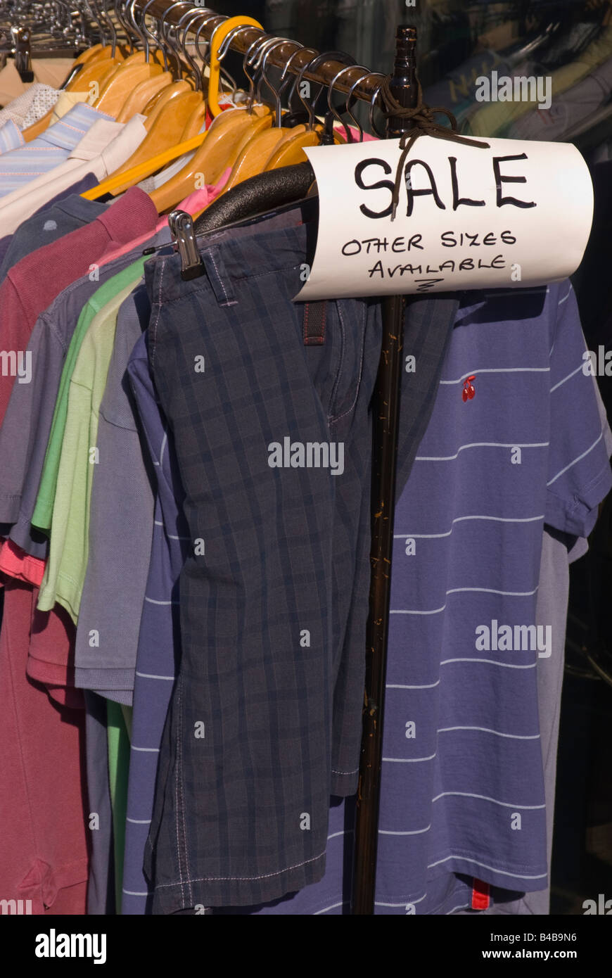 Clothes on rail outside high street shop in sale in uk Stock Photo Alamy