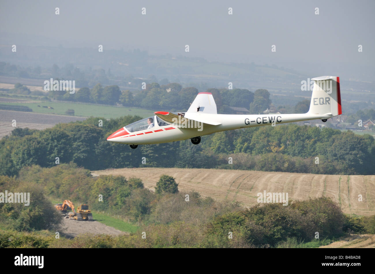 Glider flying over crop fields Dunstable Downs England Stock Photo Alamy