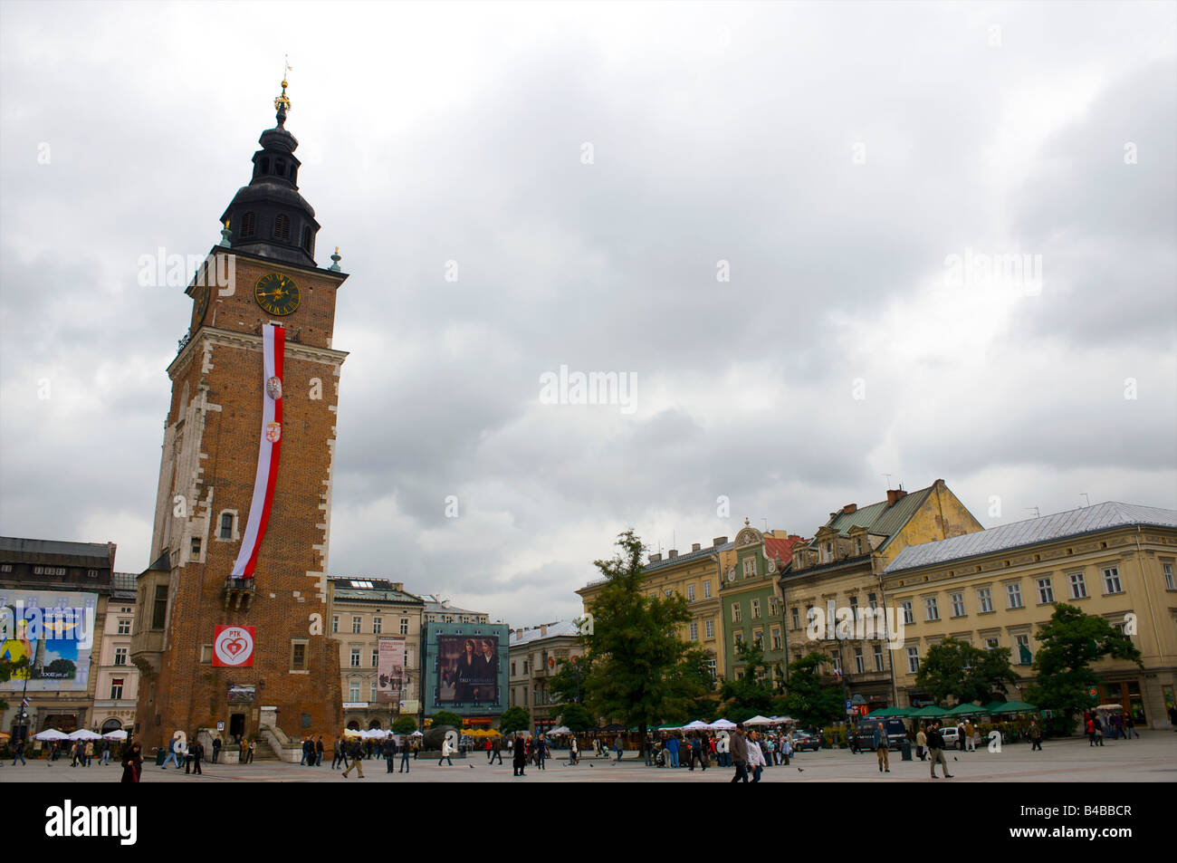 Group of people in a town square, Rynek Glowny, Krakow Historic Centre, Krakow, Lesser Poland Voivodeship, Poland Stock Photo